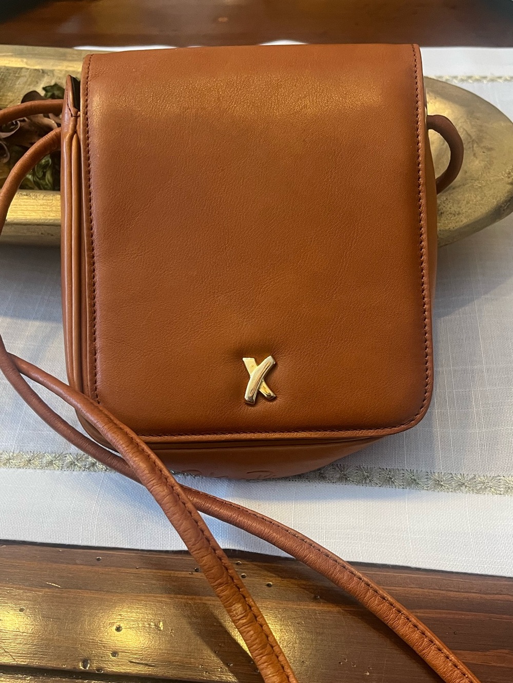 Vintage Paloma Picasso cross body leather bag with her signature “X”